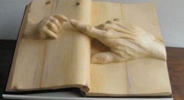 Viata sculptata in lemn si carti de Nino Orlandi