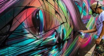 Portret multicolor in graffiti, de Hopare